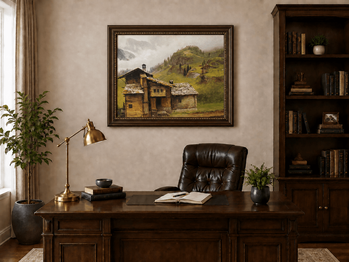 Framed hand-painted alpine landscape oil painting with a chalet, pasture and bell tower displayed above a traditional home office desk.
