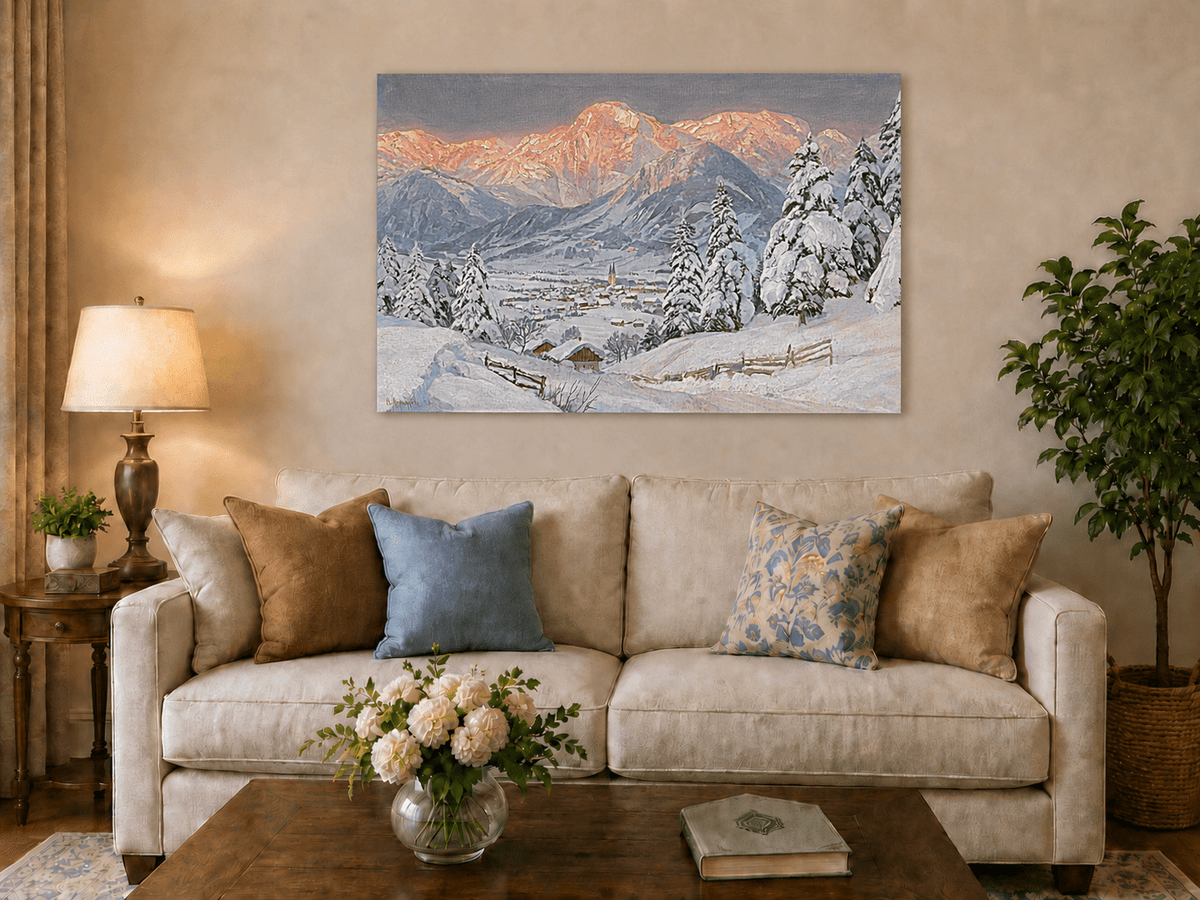 Unframed hand-painted alpine town oil painting beneath glowing pink mountain peaks displayed above a neutral living room sofa.
