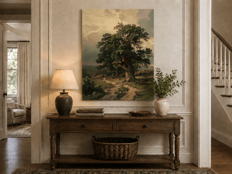 Unframed hand-painted landscape oil painting with an ancient oak tree and winding path displayed above an entryway console table.