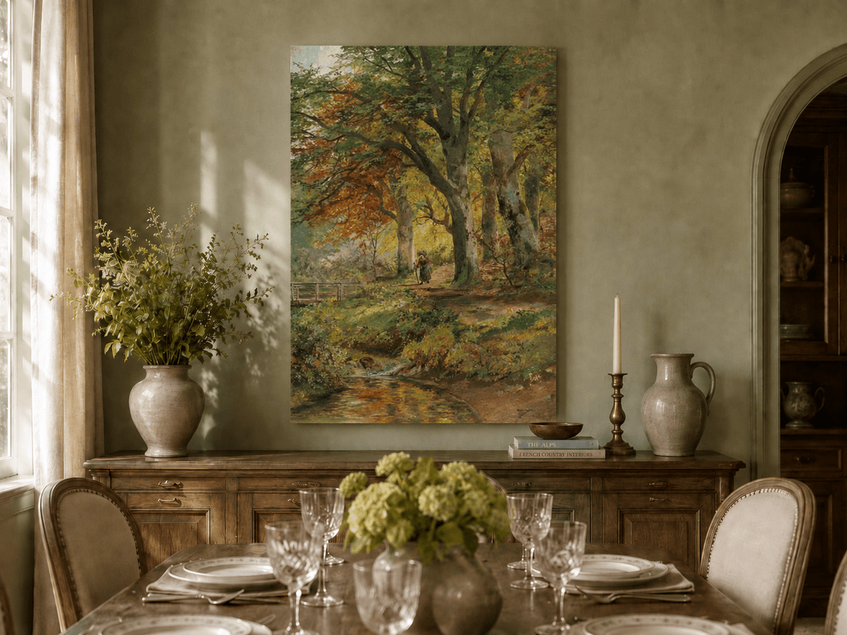 Unframed hand-painted autumn forest oil painting with a leaf-covered path beside a stream displayed above a formal dining table.