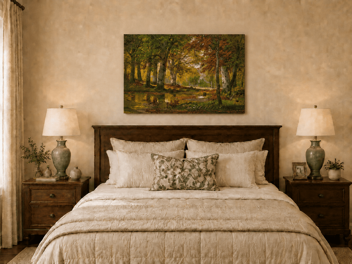 Unframed hand-painted autumn forest pond oil painting with golden trees reflected in still water displayed above a wooden bed in a neutral bedroom.