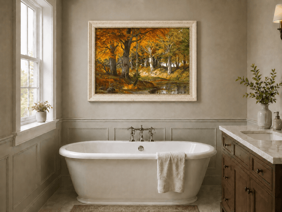 Framed hand-painted autumn forest stream oil painting glowing beneath golden trees displayed above a freestanding bathtub.