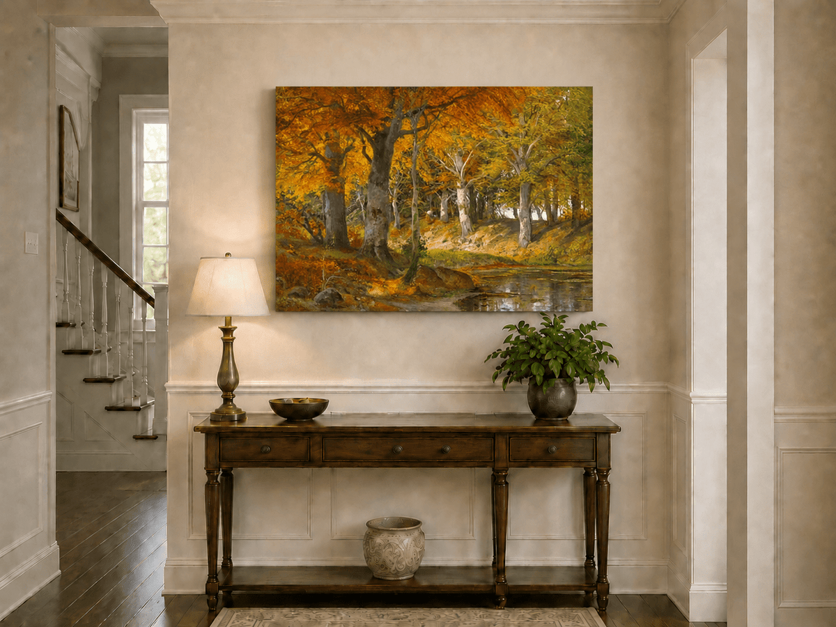 Unframed hand-painted autumn forest stream oil painting glowing beneath golden trees displayed above an entryway console table.