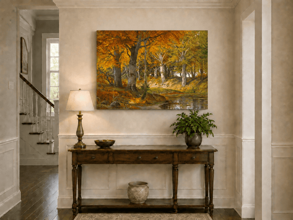 Unframed hand-painted autumn forest stream oil painting glowing beneath golden trees displayed above an entryway console table.
