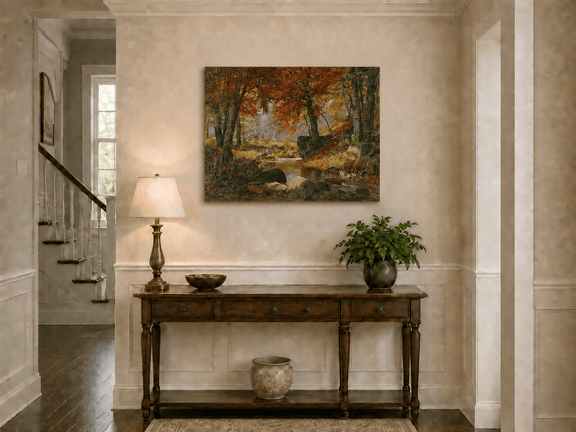 Unframed hand-painted autumn forest stream oil painting flowing around mossy boulders displayed above an entryway console table.