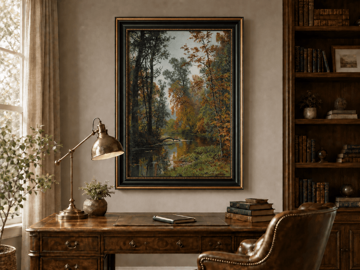 Framed hand-painted autumn forest stream oil painting with colorful trees and reflections displayed above a traditional home office desk.