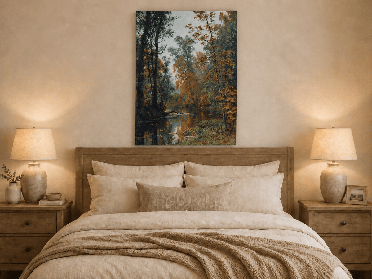 Unframed hand-painted autumn forest stream oil painting with colorful trees and reflections displayed above a wooden bed in a neutral bedroom.