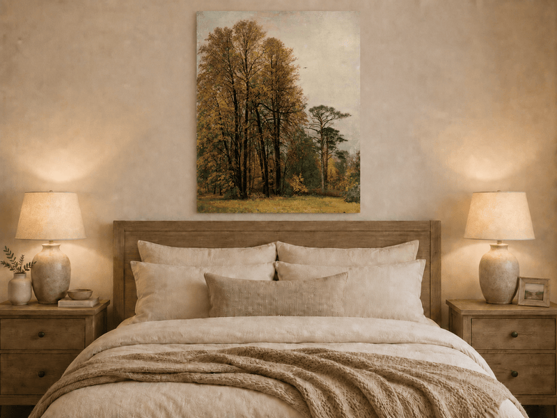Unframed hand-painted autumn forest oil painting with tall golden-leaved trees displayed above a wooden bed in a neutral bedroom.