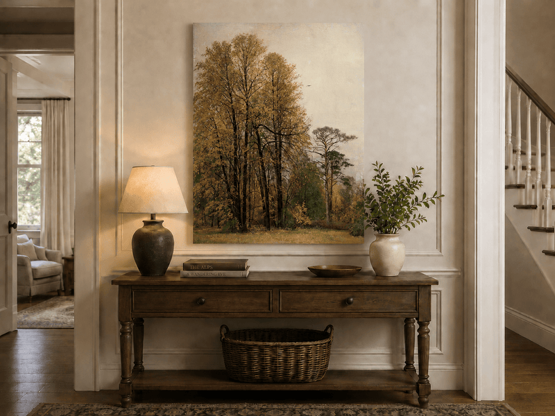 Unframed hand-painted autumn forest oil painting with tall golden-leaved trees displayed above an entryway console table.