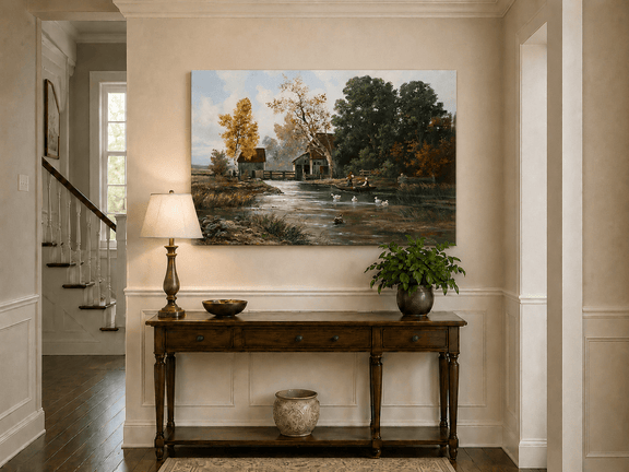 Unframed hand-painted autumn river mill oil painting with a boat and swans on the water displayed above an entryway console table.