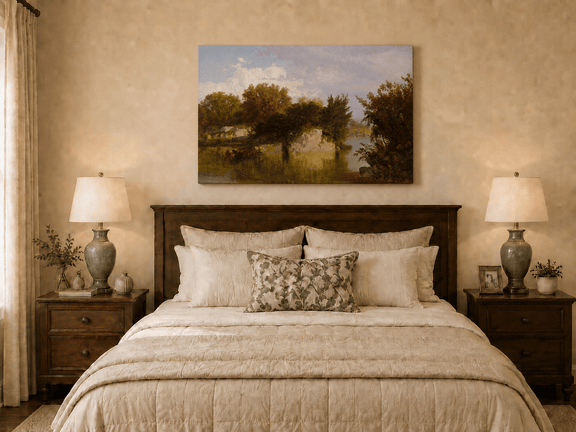 Unframed hand-painted autumn river oil painting with golden trees, a rocky bank and reflections displayed above a wooden bed in a neutral bedroom.