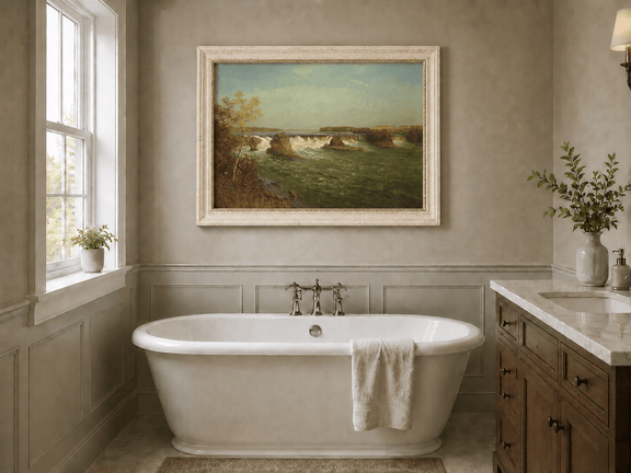Framed hand-painted autumn waterfall oil painting with rocky islands and a broad river displayed above a freestanding bathtub.