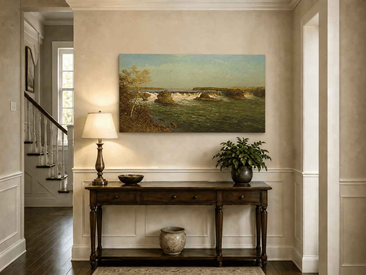 Unframed hand-painted autumn waterfall oil painting with rocky islands and a broad river displayed above an entryway console table.