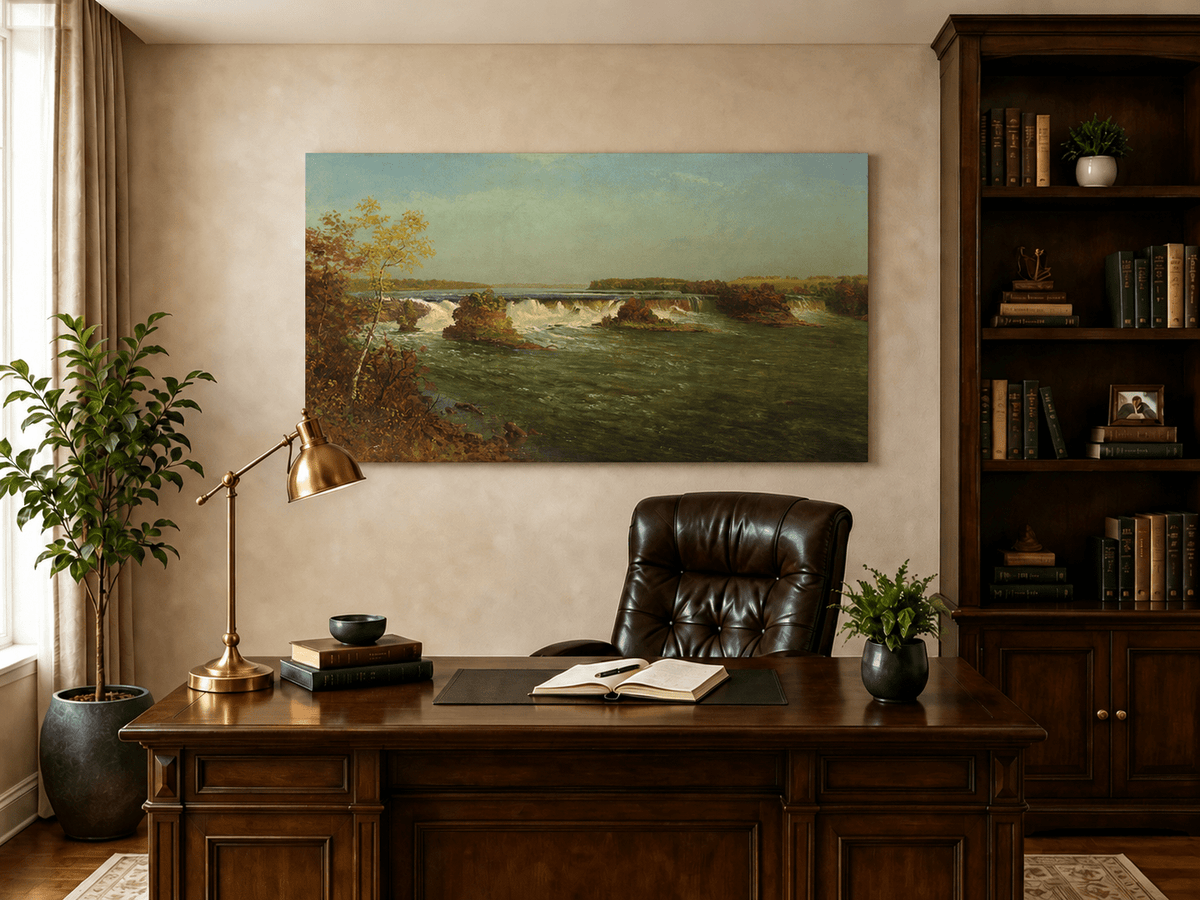 Unframed hand-painted autumn waterfall oil painting with rocky islands and a broad river displayed above a traditional home office desk.