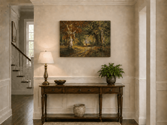 Unframed hand-painted autumn woodland path oil painting beneath tall golden trees displayed above an entryway console table.