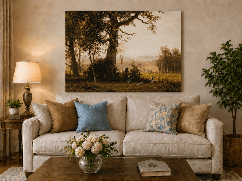Unframed hand-painted historical landscape oil painting with a battle scene in the forest displayed above a neutral living room sofa.