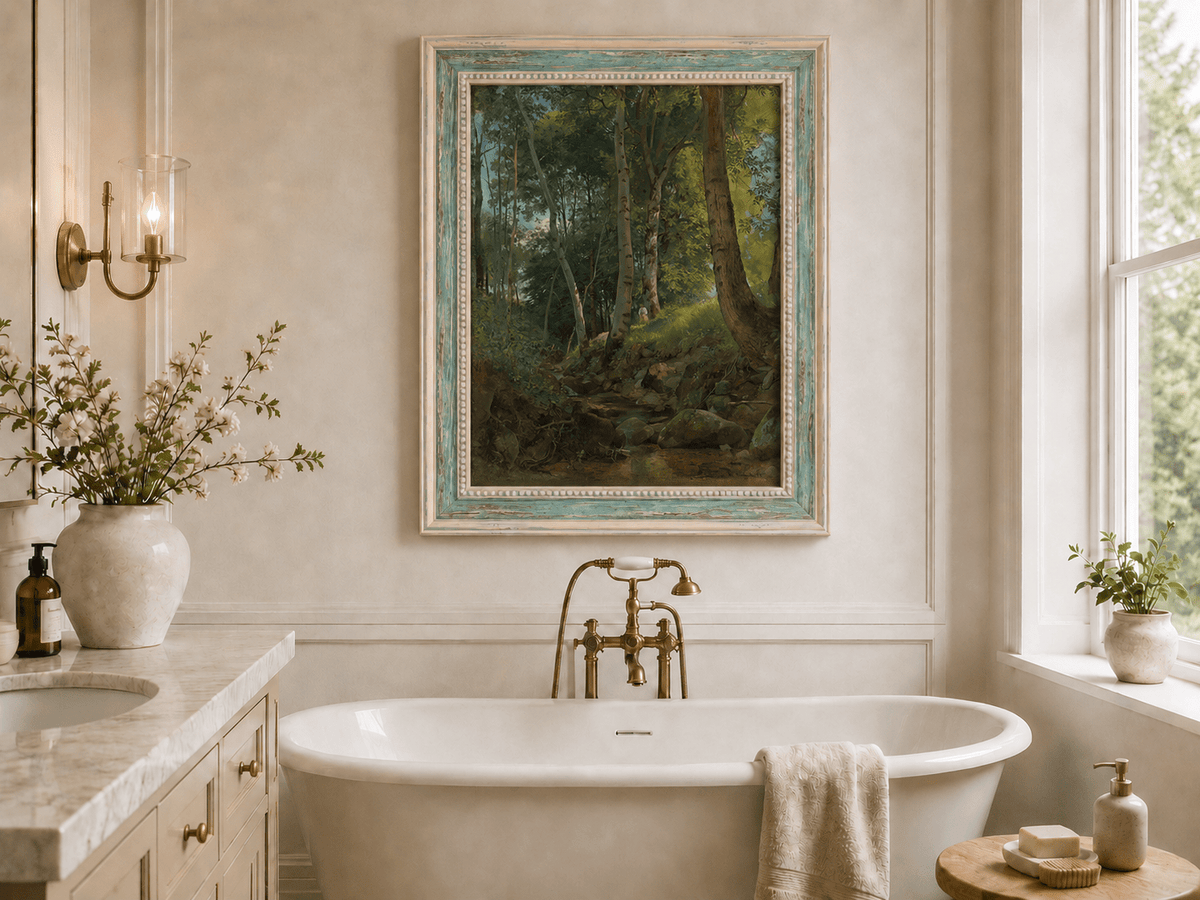 Framed hand-painted birch forest oil painting with a rocky stream displayed above a freestanding bathtub.