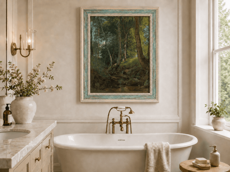 Framed hand-painted birch forest oil painting with a rocky stream displayed above a freestanding bathtub.