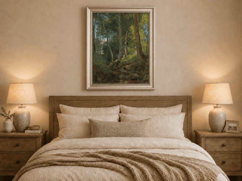 Framed hand-painted birch forest oil painting with a rocky stream displayed above a wooden bed in a neutral bedroom.