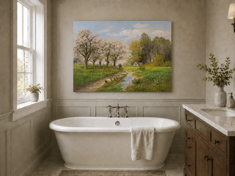 Unframed hand-painted blooming orchard oil painting with a winding path leading to a cottage displayed above a freestanding bathtub.
