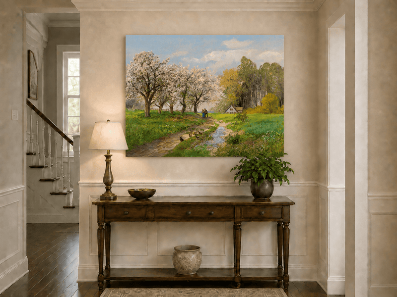 Unframed hand-painted blooming orchard oil painting with a winding path leading to a cottage displayed above an entryway console table.