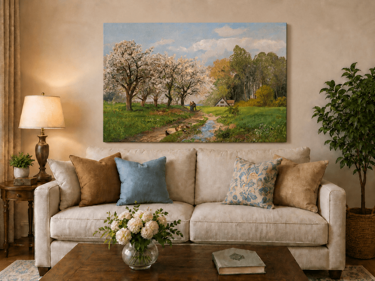 Unframed hand-painted blooming orchard oil painting with a winding path leading to a cottage displayed above a neutral living room sofa.