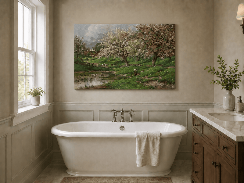 Unframed hand-painted blossom orchard oil painting beside a quiet spring pond displayed above a freestanding bathtub.