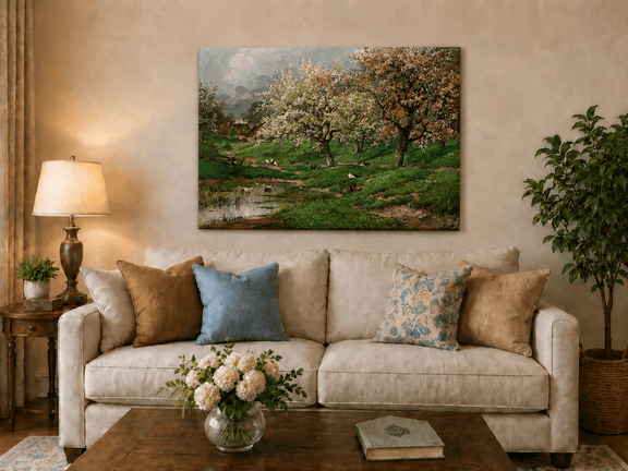 Unframed hand-painted blossom orchard oil painting beside a quiet spring pond displayed above a neutral living room sofa.