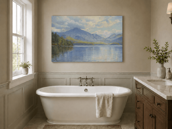 Unframed hand-painted lake oil painting with calm reflections and a forested shoreline displayed above a freestanding bathtub.
