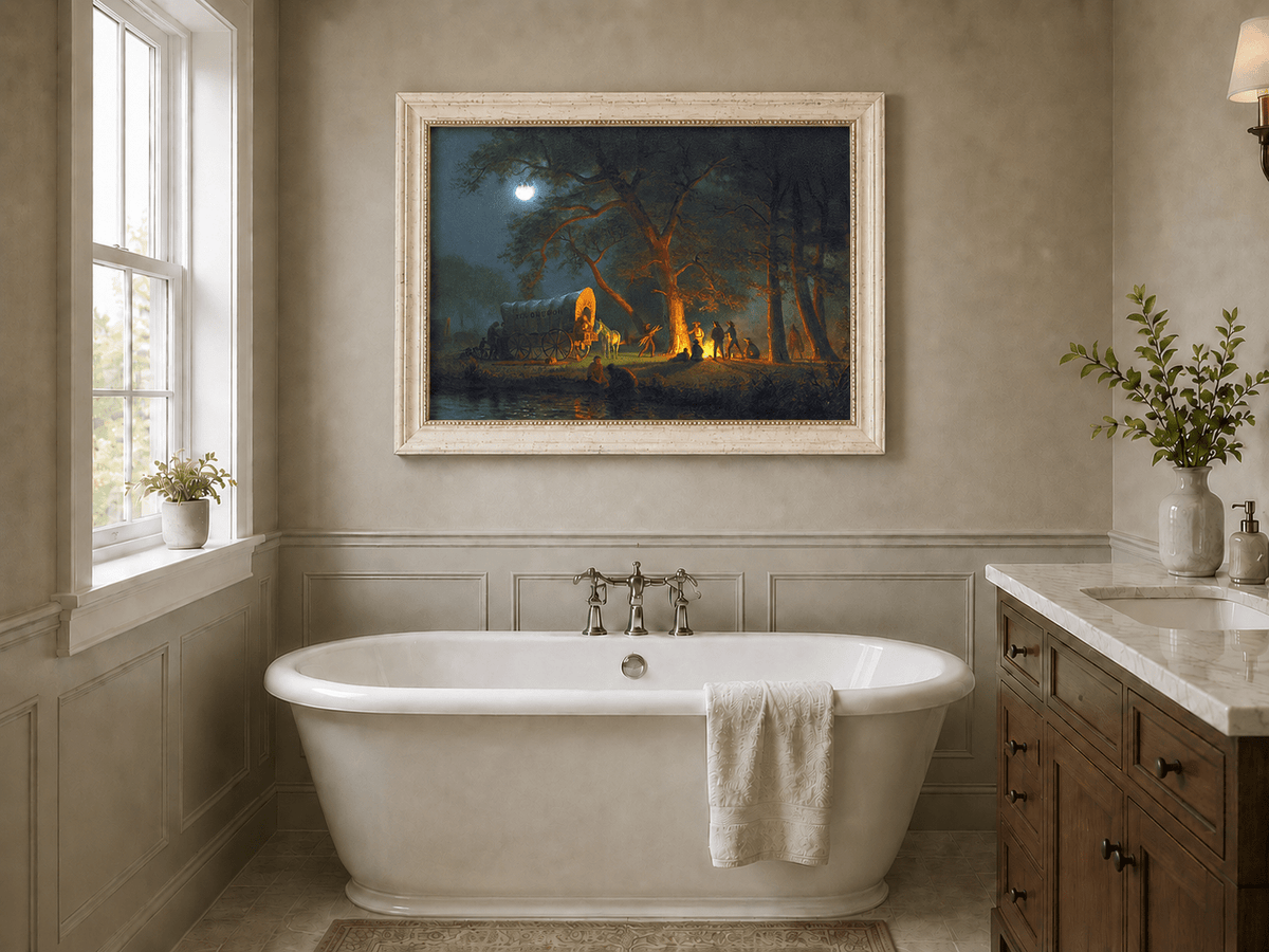Framed hand-painted moonlit forest oil painting with figures gathered around a campfire displayed above a freestanding bathtub.