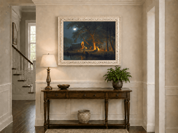 Framed hand-painted moonlit forest oil painting with figures gathered around a campfire displayed above an entryway console table.