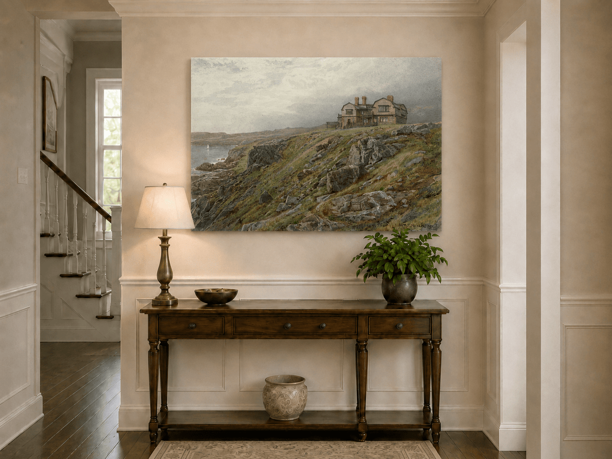 Unframed hand-painted coastal oil painting with a cliff house, rocky slopes and seaside view displayed above an entryway console table.