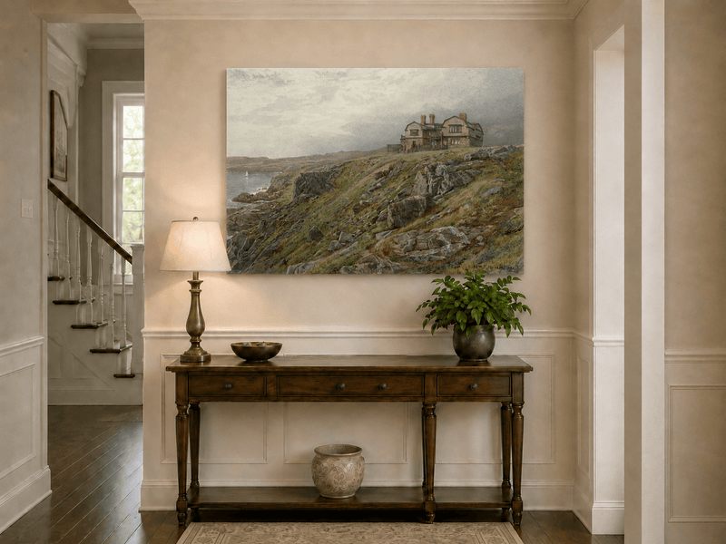 Unframed hand-painted coastal oil painting with a cliff house, rocky slopes and seaside view displayed above an entryway console table.