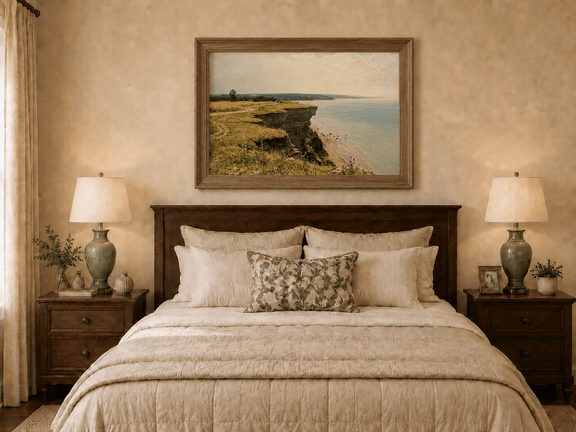 Framed hand-painted coastal landscape oil painting with a grassy cliff and expansive sea view displayed above a wooden bed in a neutral bedroom.