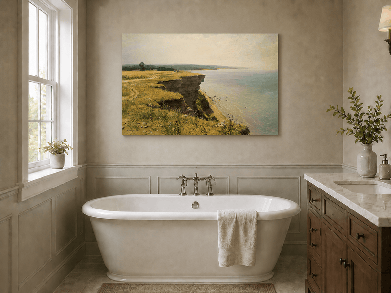Unframed hand-painted coastal landscape oil painting with a grassy cliff and expansive sea view displayed above a freestanding bathtub.