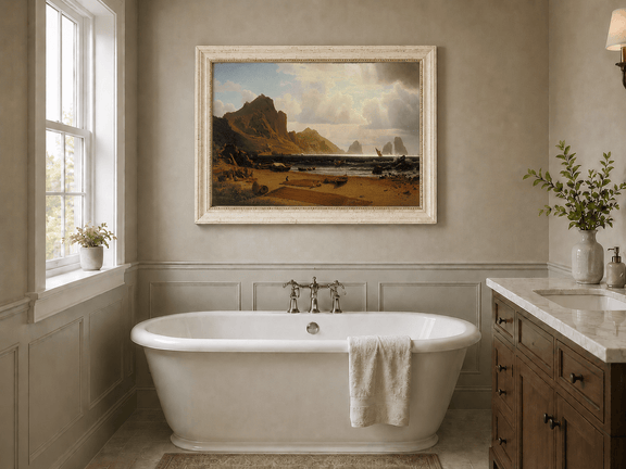 Framed hand-painted coastal cliffs oil painting with fishing boats and figures on a rocky beach displayed above a freestanding bathtub.