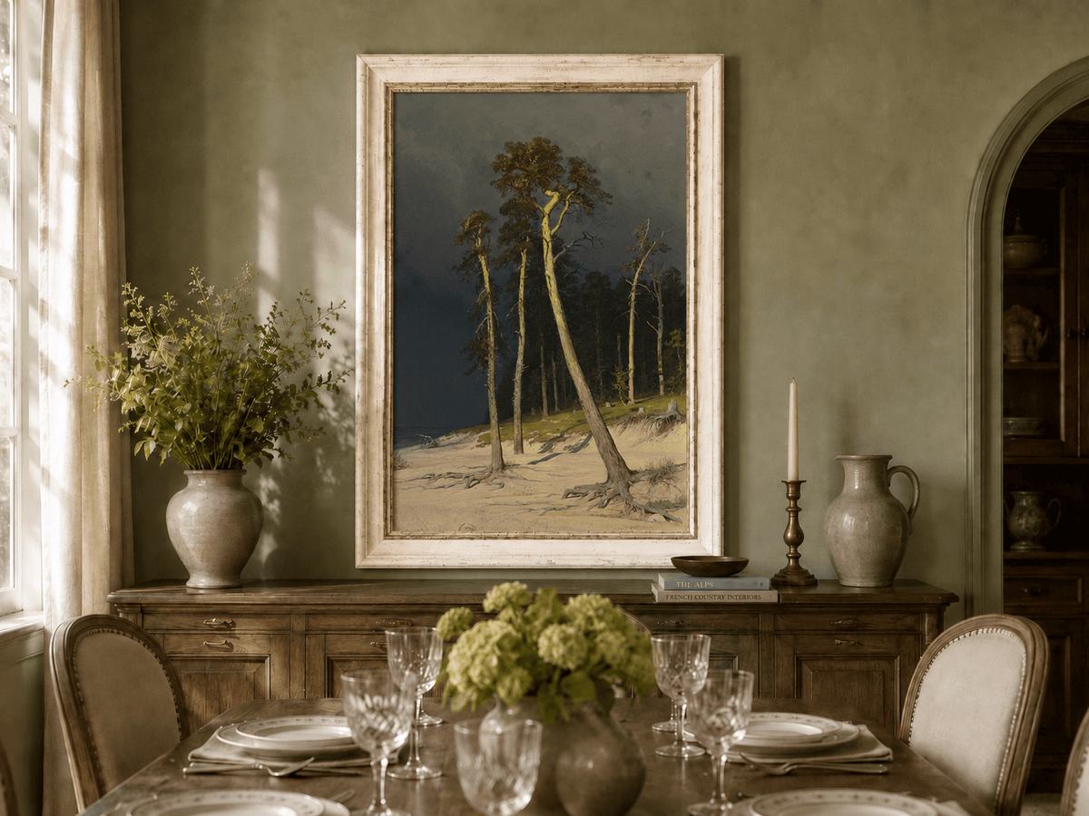Framed hand-painted coastal forest oil painting with tall pines on a sandy shore displayed above a formal dining table.