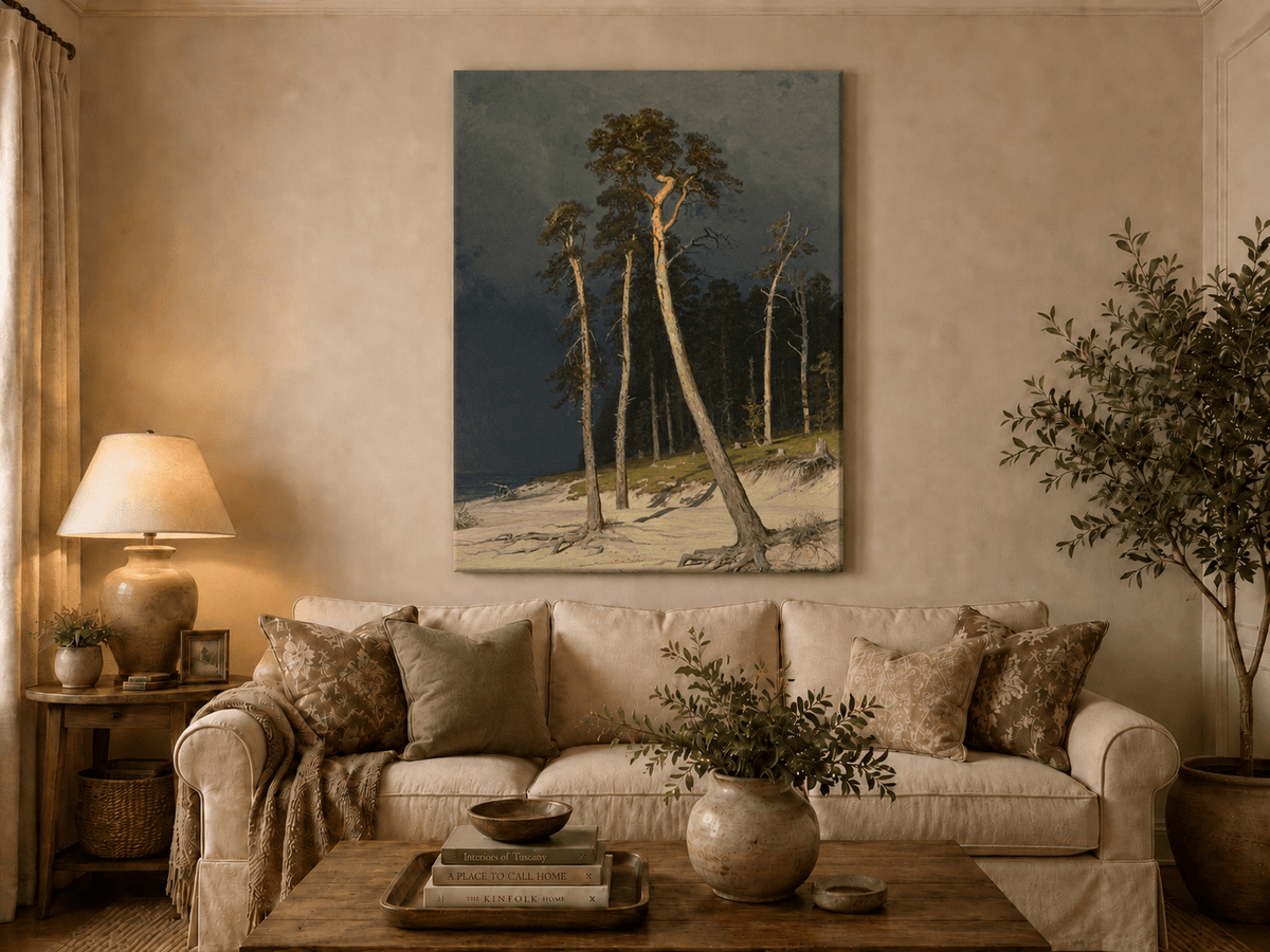 Unframed hand-painted coastal forest oil painting with tall pines on a sandy shore displayed above a neutral living room sofa.