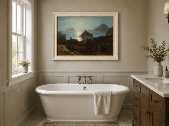 Framed hand-painted coastal oil painting with a rocky shoreline, wildlife and distant sea stacks displayed above a freestanding bathtub.
