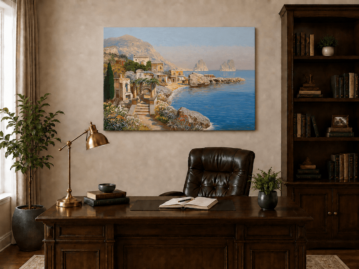 Unframed hand-painted coastal village oil painting with blue sea and a rocky shoreline displayed above a traditional home office desk.