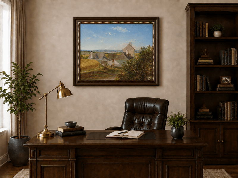 Framed hand-painted country houses oil painting with a winding road and distant city view displayed above a traditional home office desk.