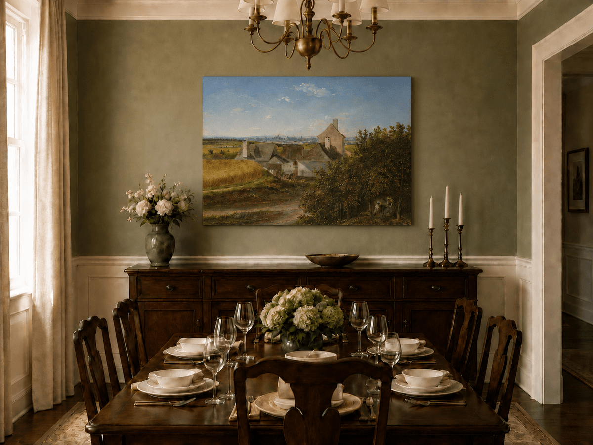 Unframed hand-painted country houses oil painting with a winding road and distant city view displayed above a formal dining table.