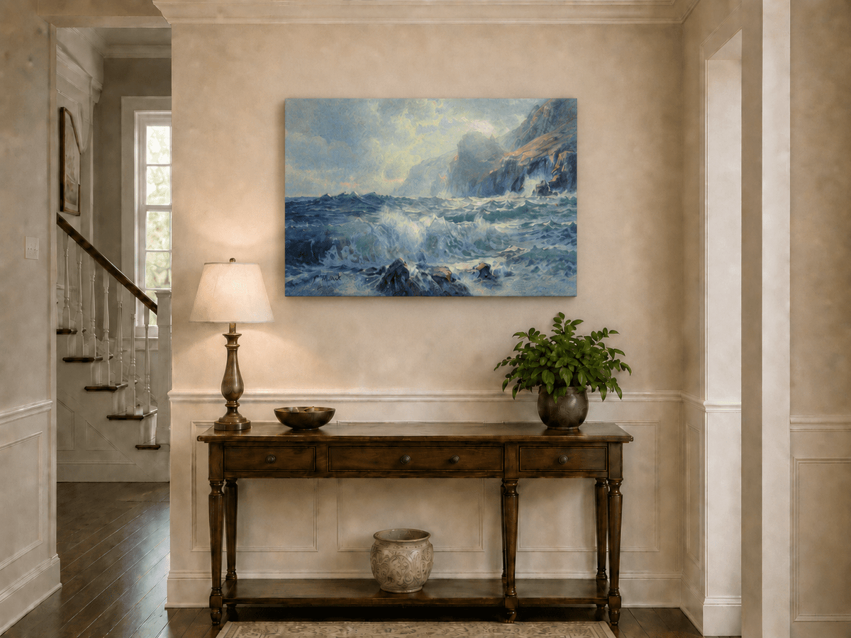 Unframed hand-painted seascape oil painting with crashing waves along a rocky coastal shore displayed above an entryway console table.
