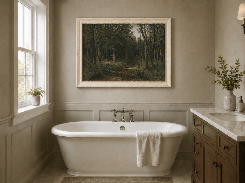 Framed hand-painted dense forest path oil painting with shadowed trees and fallen branches displayed above a freestanding bathtub.