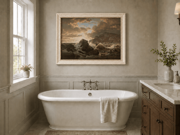 Framed hand-painted dramatic coastal seascape with crashing waves and dark rocks displayed above a freestanding bathtub.