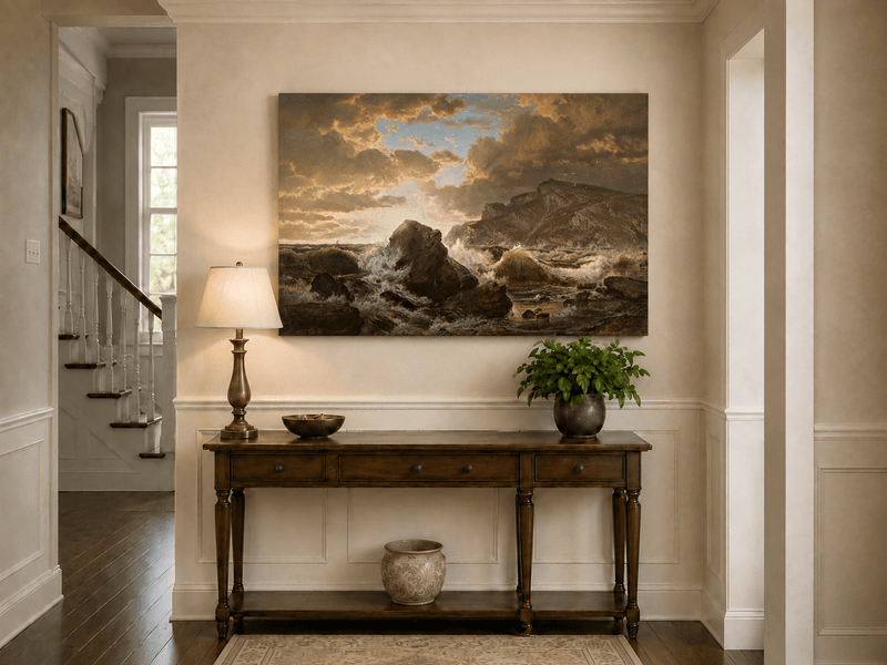 Unframed hand-painted dramatic coastal seascape with crashing waves and dark rocks displayed above an entryway console table.