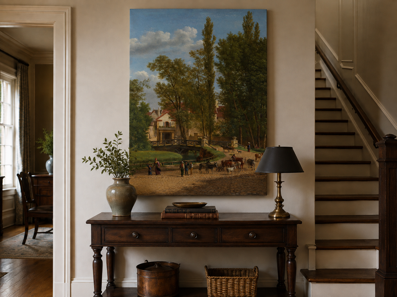 Hand-painted European country estate scene landscape oil painting displayed above a console table in a hallway interior.