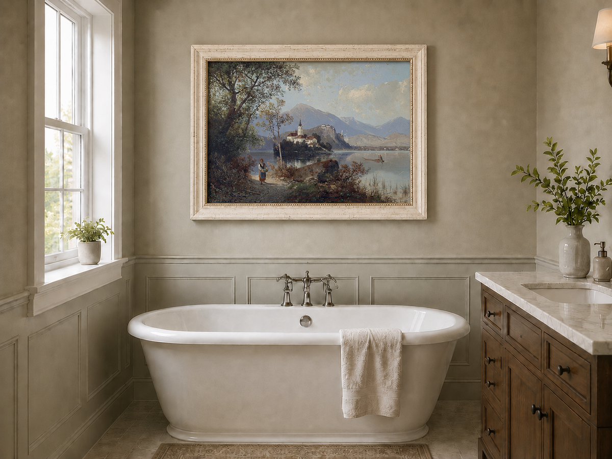 Hand-painted European lakeside village landscape oil painting displayed in a bathroom interior above a bathtub.