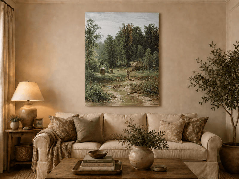 Unframed hand-painted forest cottage oil painting with a stream, path and walking figure displayed above a neutral living room sofa.