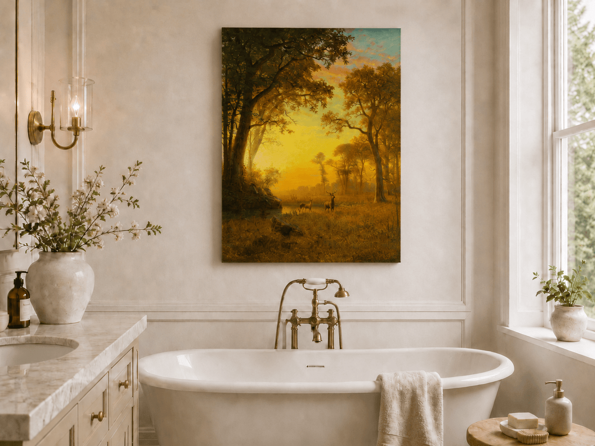 Unframed hand-painted forest oil painting with deer by a stream at golden sunset displayed above a freestanding bathtub.